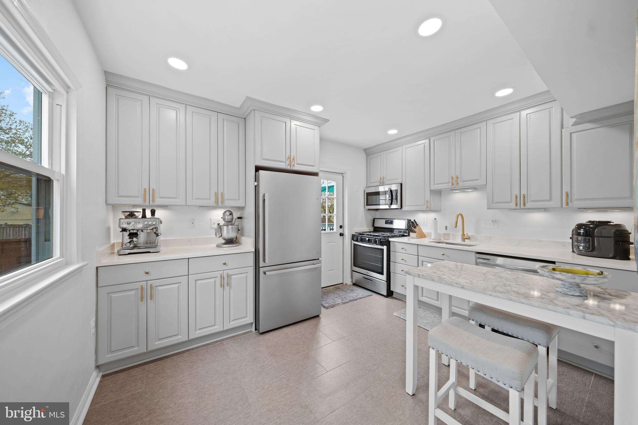 2837 Cameron Road Falls Church, VA 22042 - Photo 10 of 42 a kitchen with refrigerator and cabinets