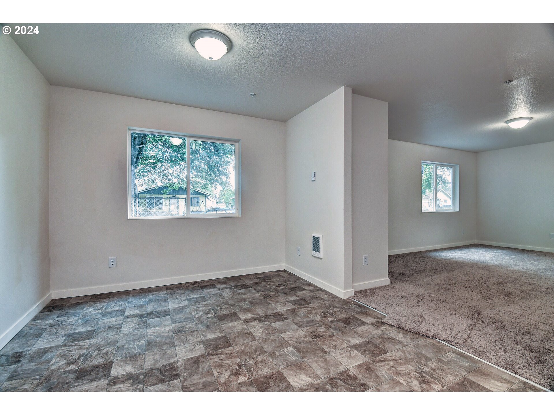 257 20th Avenue Longview, WA 98632 - Photo 6 of 16 a view of an empty room and window