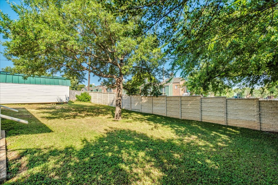706 Windsor Road Round Rock, TX 78664 - Photo 28 of 29 a view of a backyard