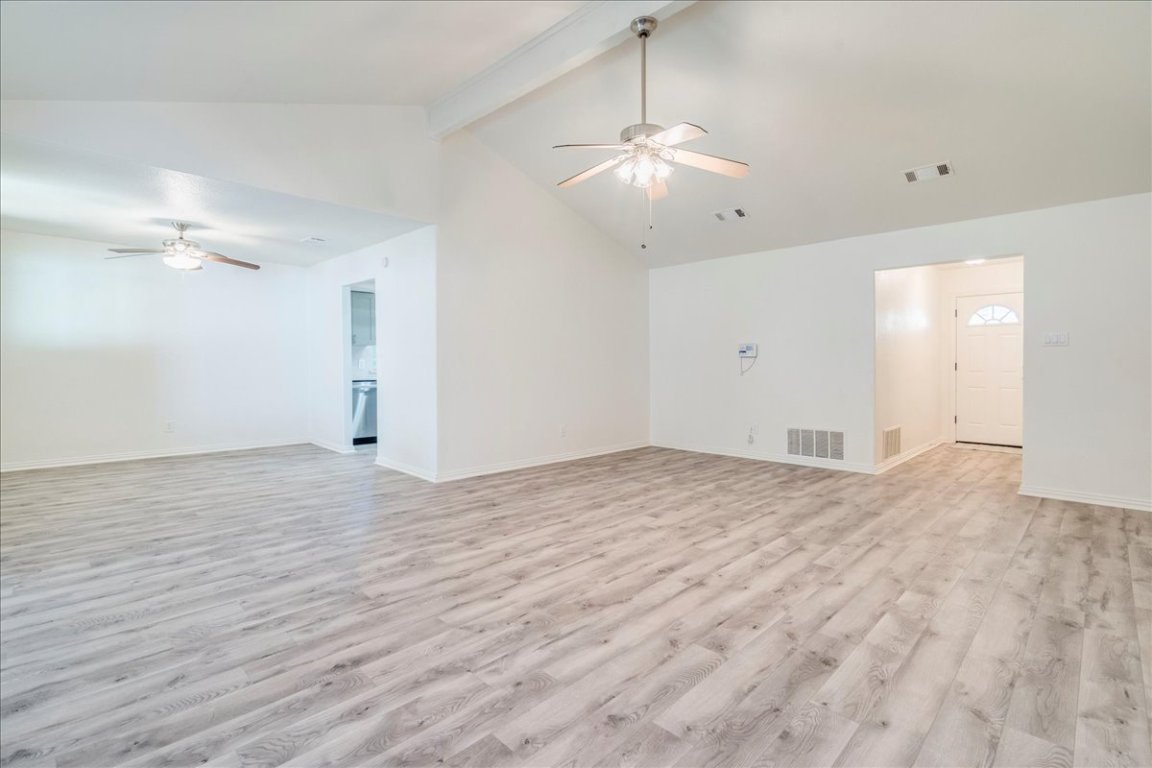 706 Windsor Road Round Rock, TX 78664 - Photo 8 of 29 a view of empty room with wooden floor