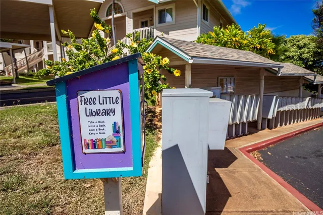 a view of outdoor space with garden and trees