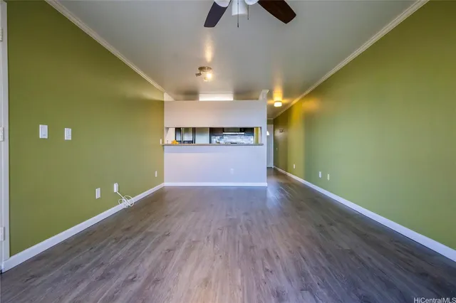 a view of a livingroom with wooden floor