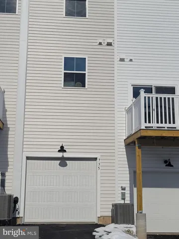 a car parked in front of a building