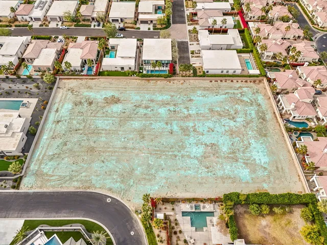 a view of a balcony with chairs