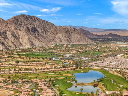 a view of ocean with mountains