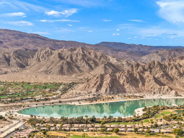 a view of a lake with mountains in the background