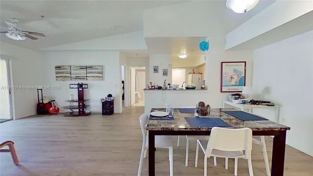 a view of a dining room with furniture