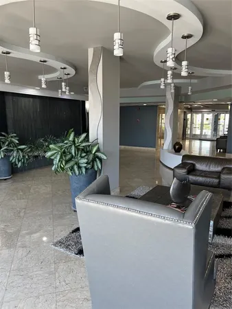 a view of a lobby area with a potted plant
