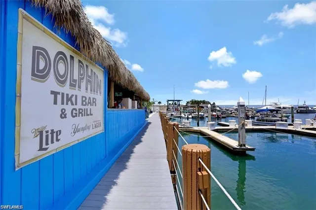 a view of a chairs and table in patio