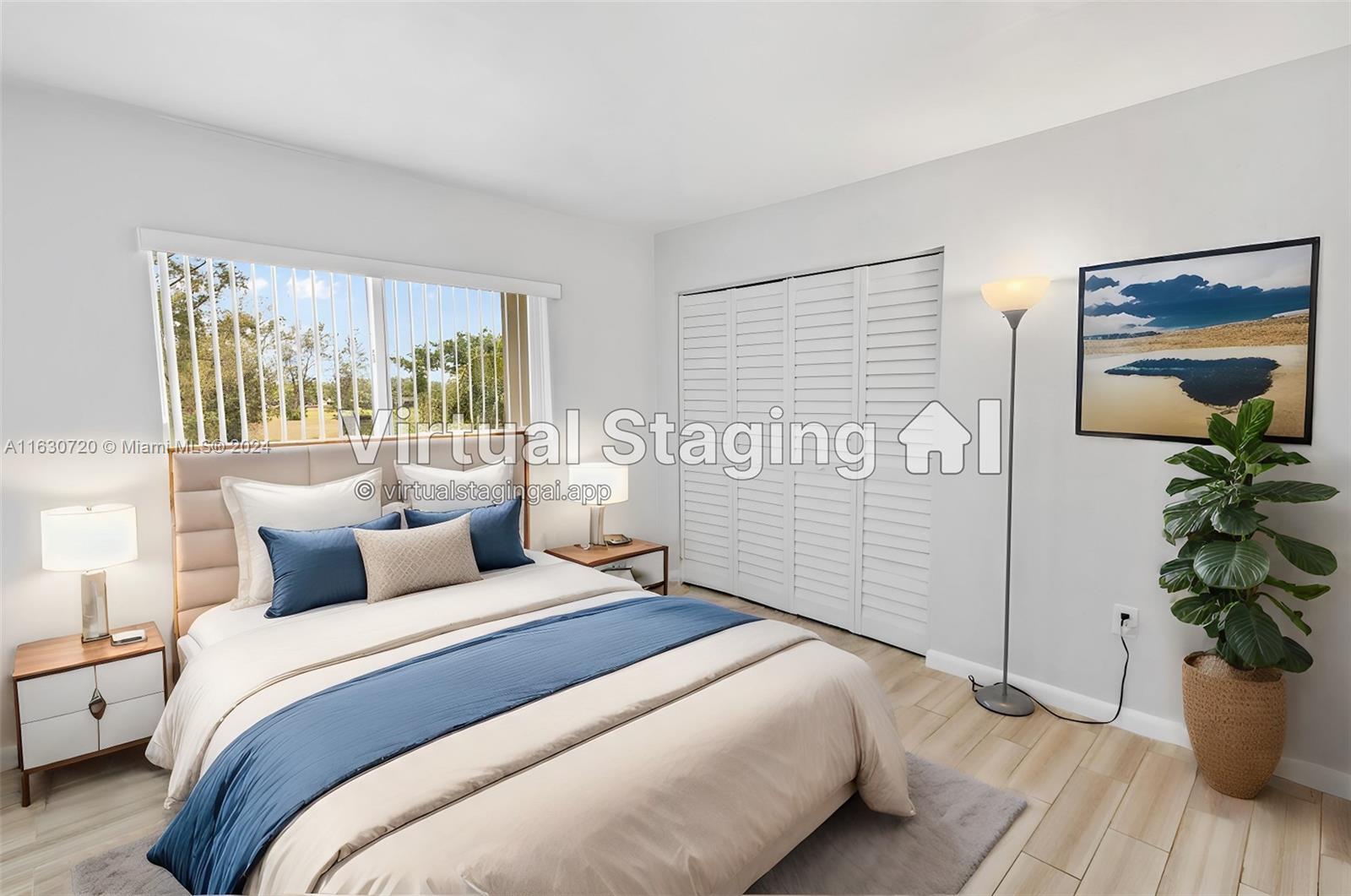 7430 Miami Lakes Drive, Unit E302 Miami Lakes, FL 33014 - Photo 2 of 29 a bedroom with a balcony a bed and a potted plant