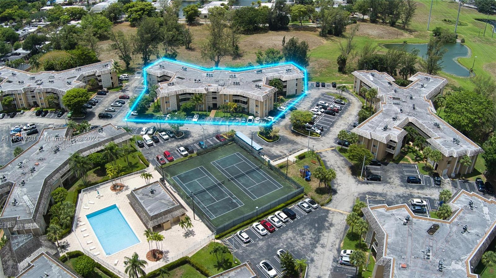 7430 Miami Lakes Drive, Unit E302 Miami Lakes, FL 33014 - Photo 22 of 29 an aerial view of a house with outdoor space