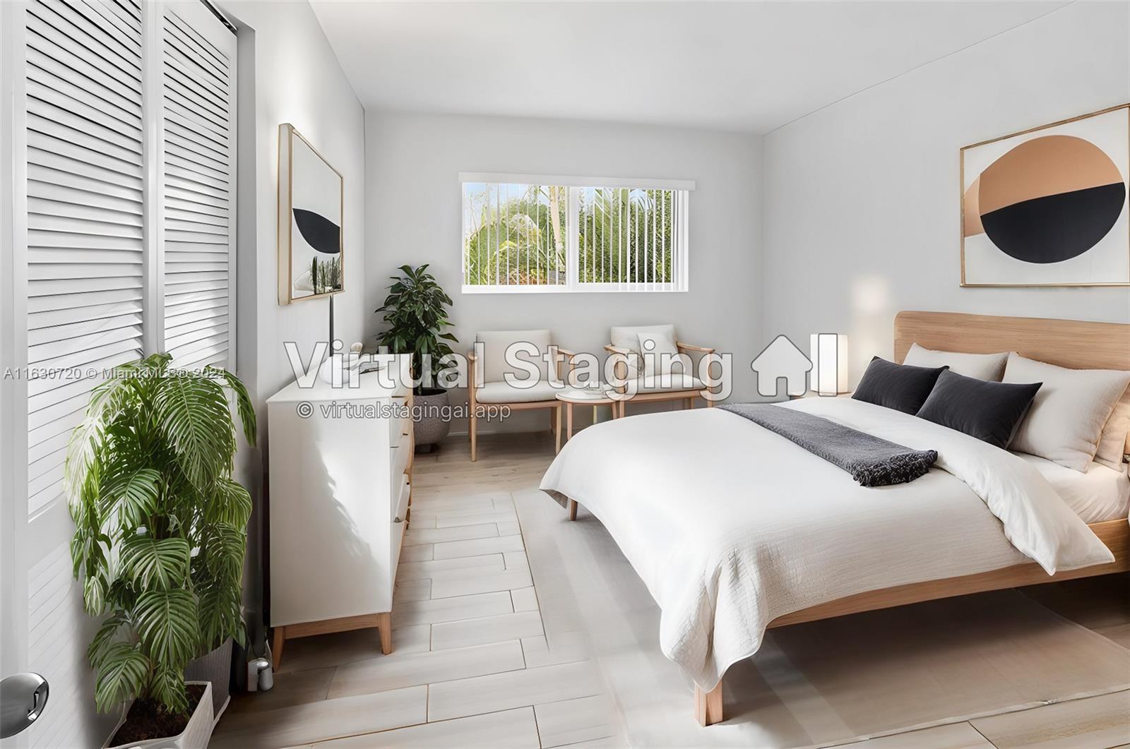 7430 Miami Lakes Drive, Unit E302 Miami Lakes, FL 33014 - Photo 3 of 29 a bedroom with bed and window