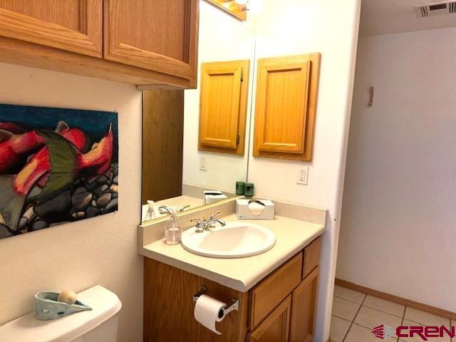 30022 Rd L Mancos, CO 81328 - Photo 11 of 16 a bathroom with a sink and a mirror
