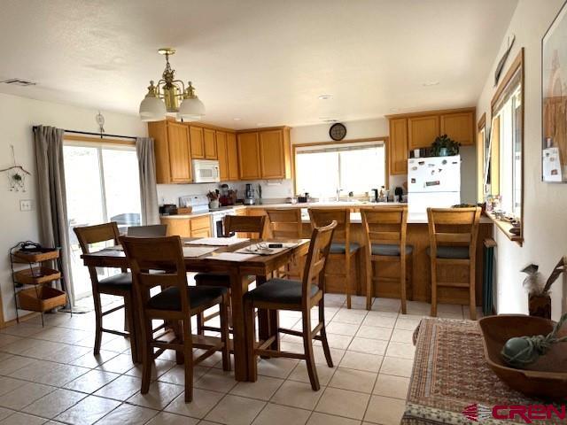 30022 Rd L Mancos, CO 81328 - Photo 5 of 16 a view of a dining room with furniture