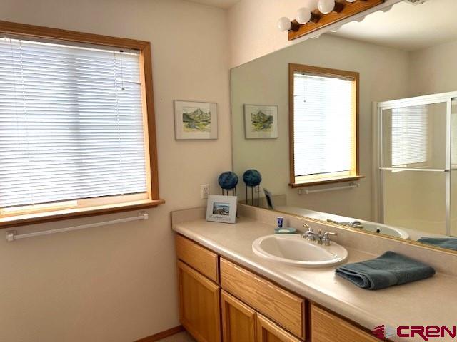 30022 Rd L Mancos, CO 81328 - Photo 10 of 16 a bathroom with a sink and a window