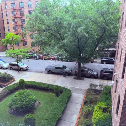 a view of a garden with patio