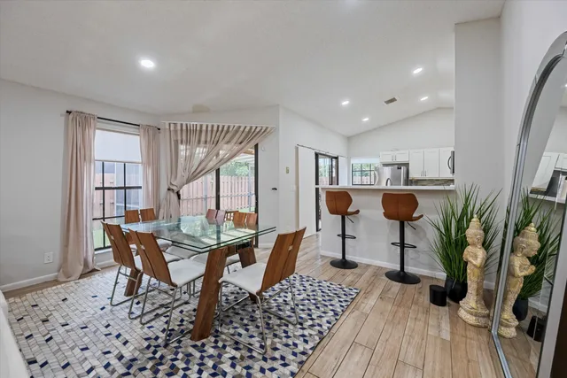 a workspace with furniture and wooden floor
