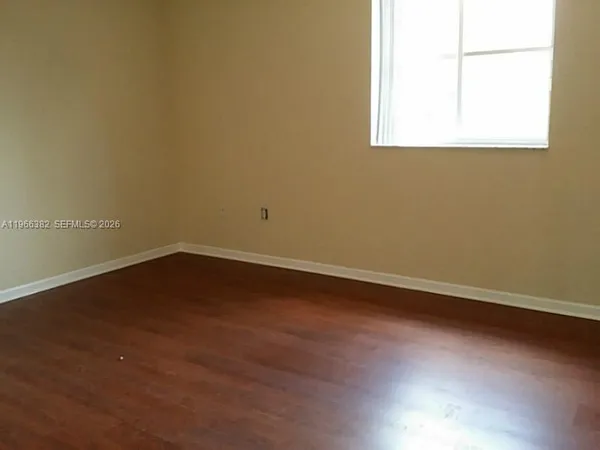an empty room with a window