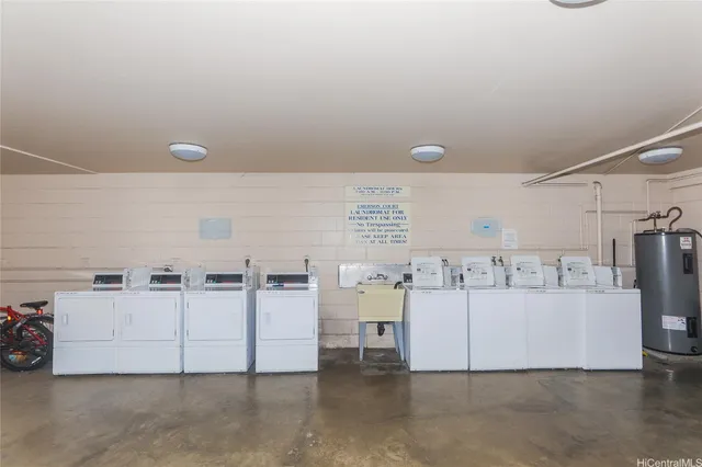 a view of a kitchen with appliances and cabinets