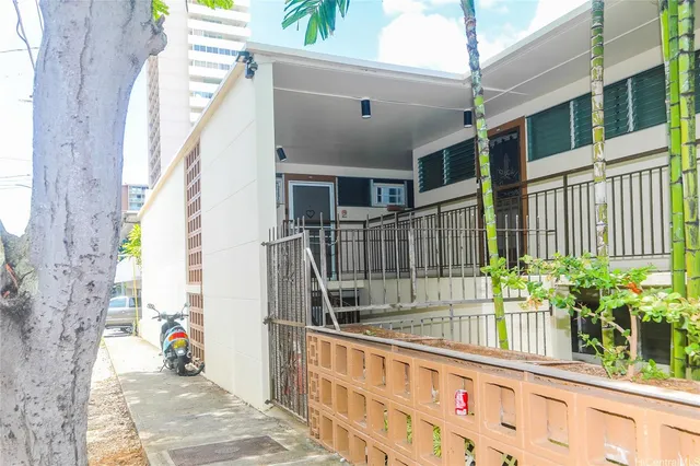 a view of balcony with a potted plant