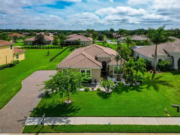 an aerial view of a house with garden