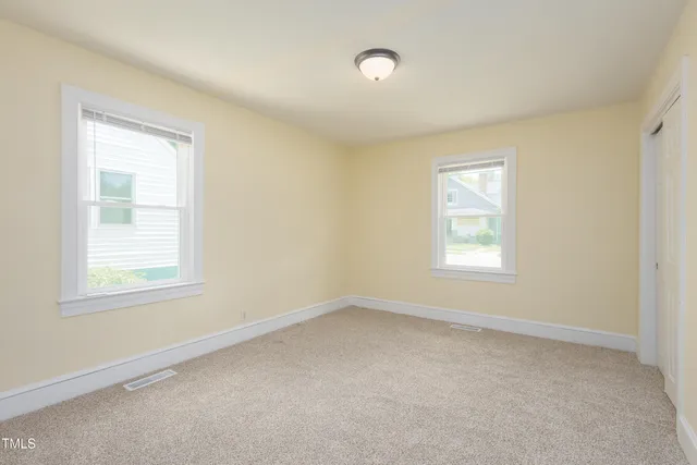 an empty room with a window