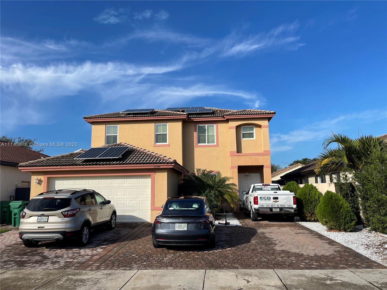 a car parked in front of a house