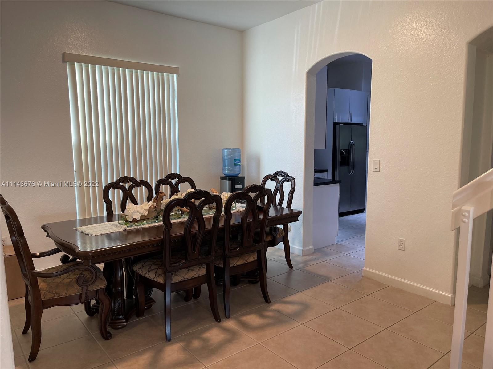 23744 Southwest 108th Court Homestead, FL 33032 - Photo 3 of 22 a view of a dining room with furniture