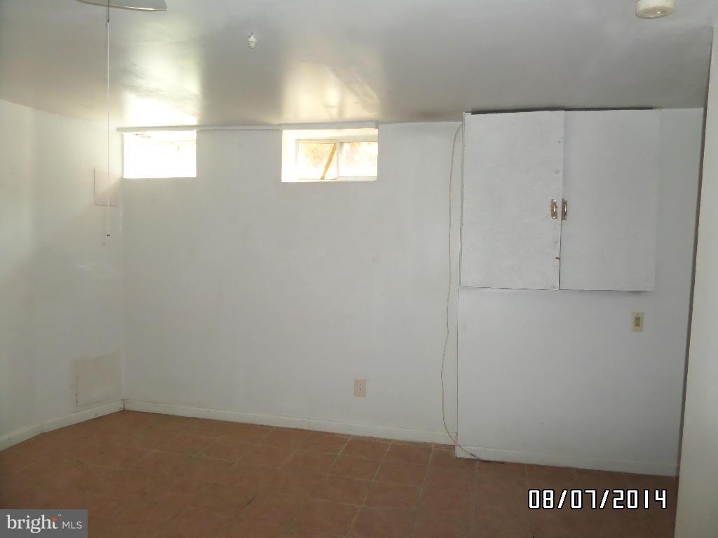 1363 Spelman Road Baltimore, MD 21225 - Photo 8 of 16 a view of an empty room