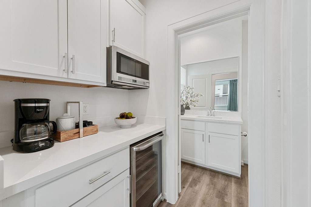 1208 Highland Row Lane Houston, TX 77091 - Photo 12 of 29 *Photos of staged model home. Finish package will feature blonde flooring with green and taupe cabinetry.