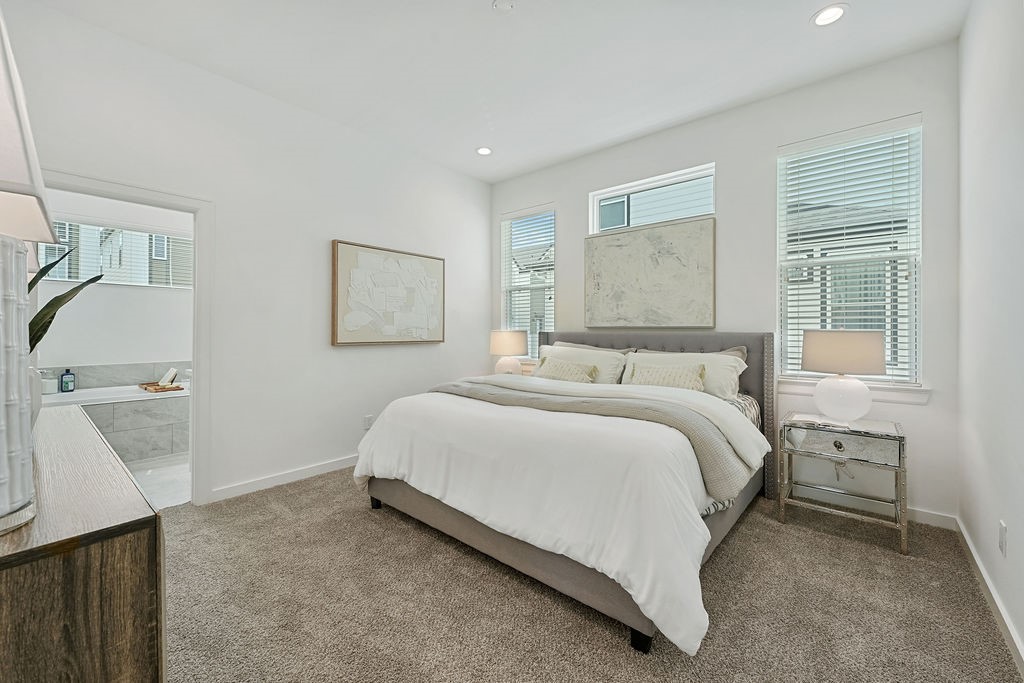 1208 Highland Row Lane Houston, TX 77091 - Photo 17 of 29 *Photos of staged model home. Finish package will feature blonde flooring with green and taupe cabinetry.