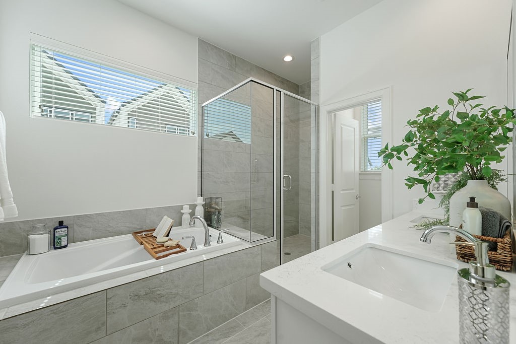 1208 Highland Row Lane Houston, TX 77091 - Photo 18 of 29 *Photos of staged model home. Finish package will feature blonde flooring with green and taupe cabinetry.