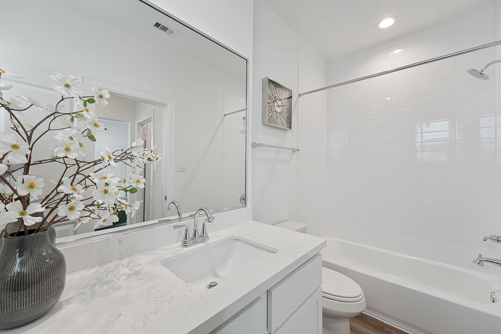 1208 Highland Row Lane Houston, TX 77091 - Photo 20 of 29 *Photos of staged model home. Finish package will feature blonde flooring with green and taupe cabinetry.