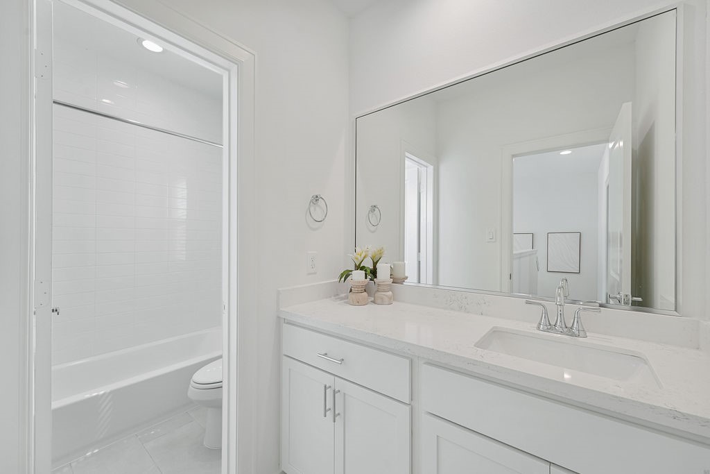 1208 Highland Row Lane Houston, TX 77091 - Photo 23 of 29 *Photos of staged model home. Finish package will feature blonde flooring with green and taupe cabinetry.