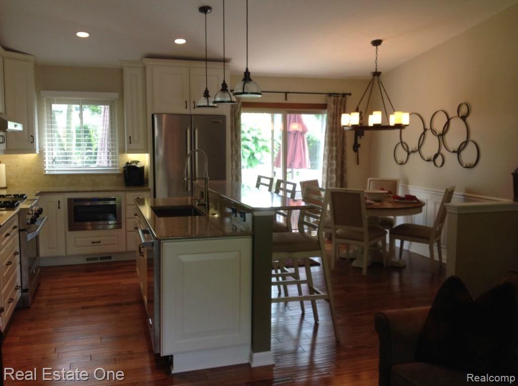 3711 Loon Lake Road Wixom, MI 48393 - Photo 11 of 40 VIEW FROM GREAT ROOM OF KITCHEN AND BREAKFAST NOOK