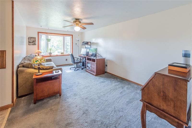 6 Kinzua Road Pittsburgh, PA 15239 - Photo 11 of 25 1st level family room off the other side of kitch