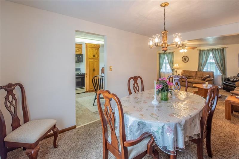 6 Kinzua Road Pittsburgh, PA 15239 - Photo 8 of 25 Dining room view of the living room and kitchen.