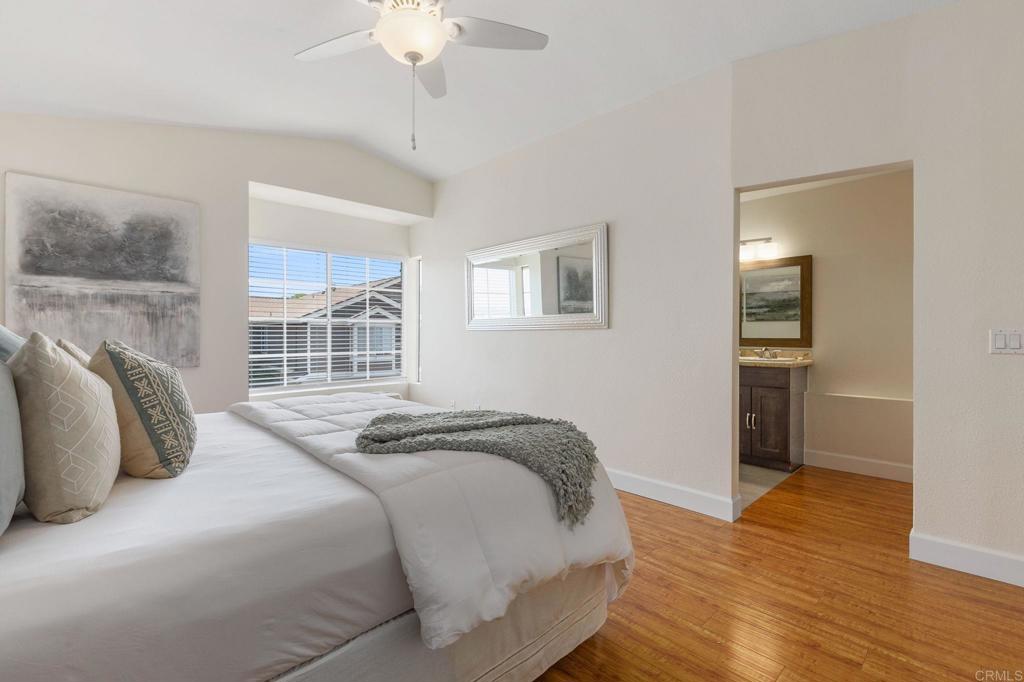 2992 Brandon Circle Carlsbad, CA 92010 - Photo 22 of 69 a bedroom with a bed and a window