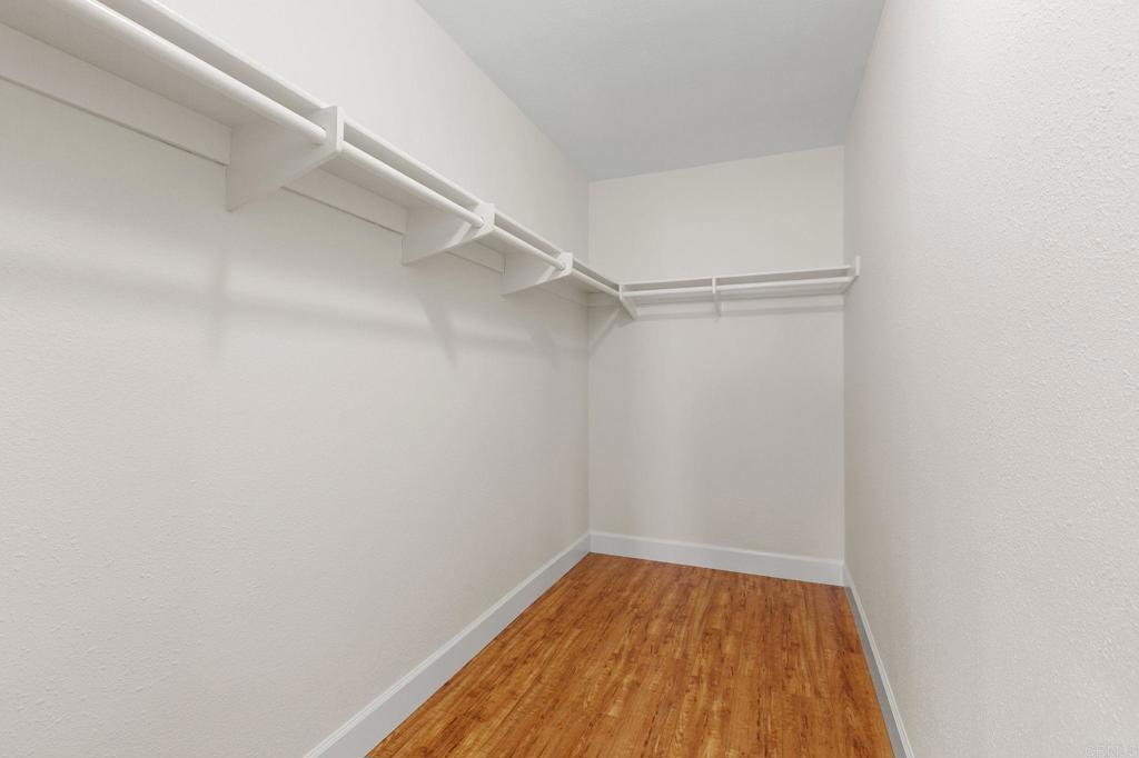 2992 Brandon Circle Carlsbad, CA 92010 - Photo 24 of 69 a view of a room with wooden floor