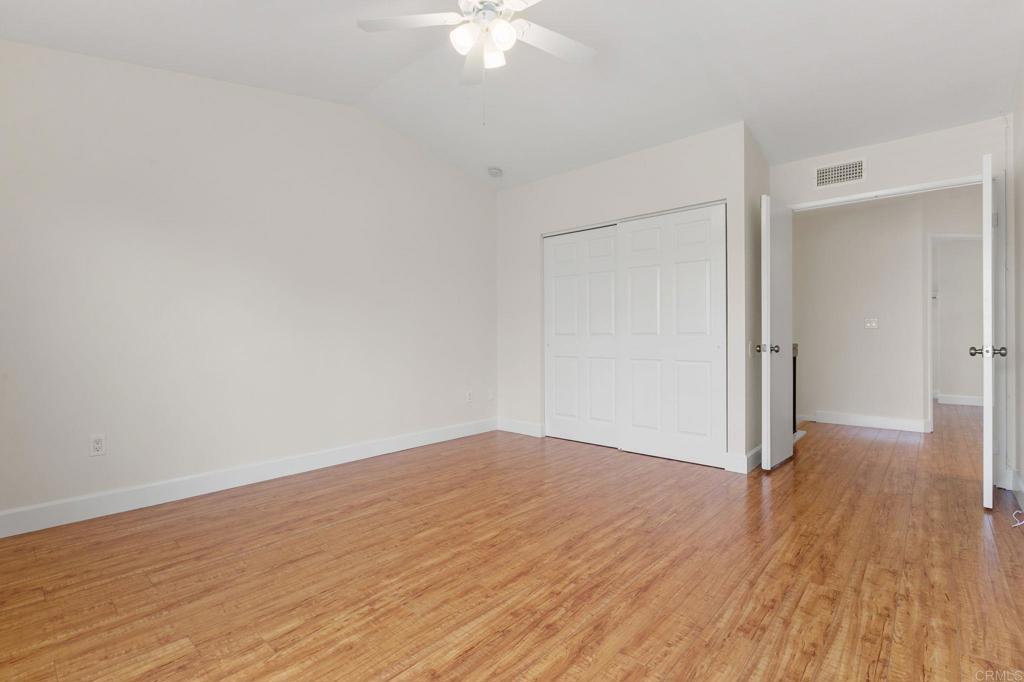 2992 Brandon Circle Carlsbad, CA 92010 - Photo 27 of 69 wooden floor in an empty room