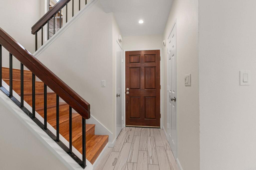 2992 Brandon Circle Carlsbad, CA 92010 - Photo 5 of 69 a view of an entryway with wooden floor