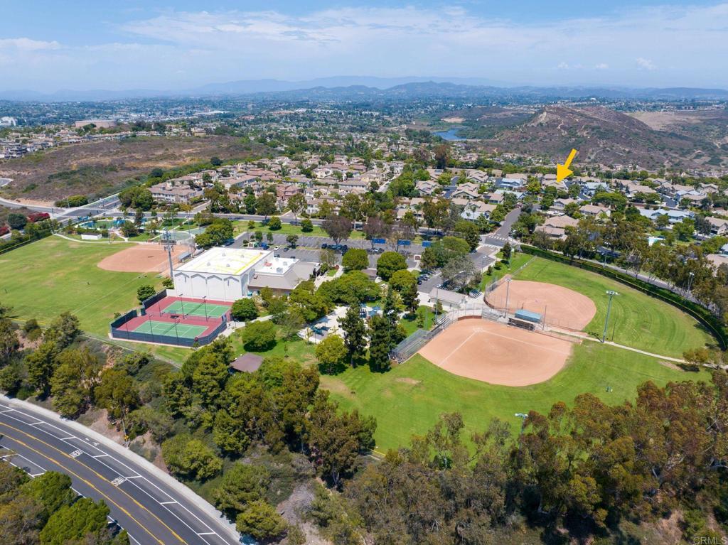 2992 Brandon Circle Carlsbad, CA 92010 - Photo 54 of 69 an aerial view of residential houses with outdoor space and trees