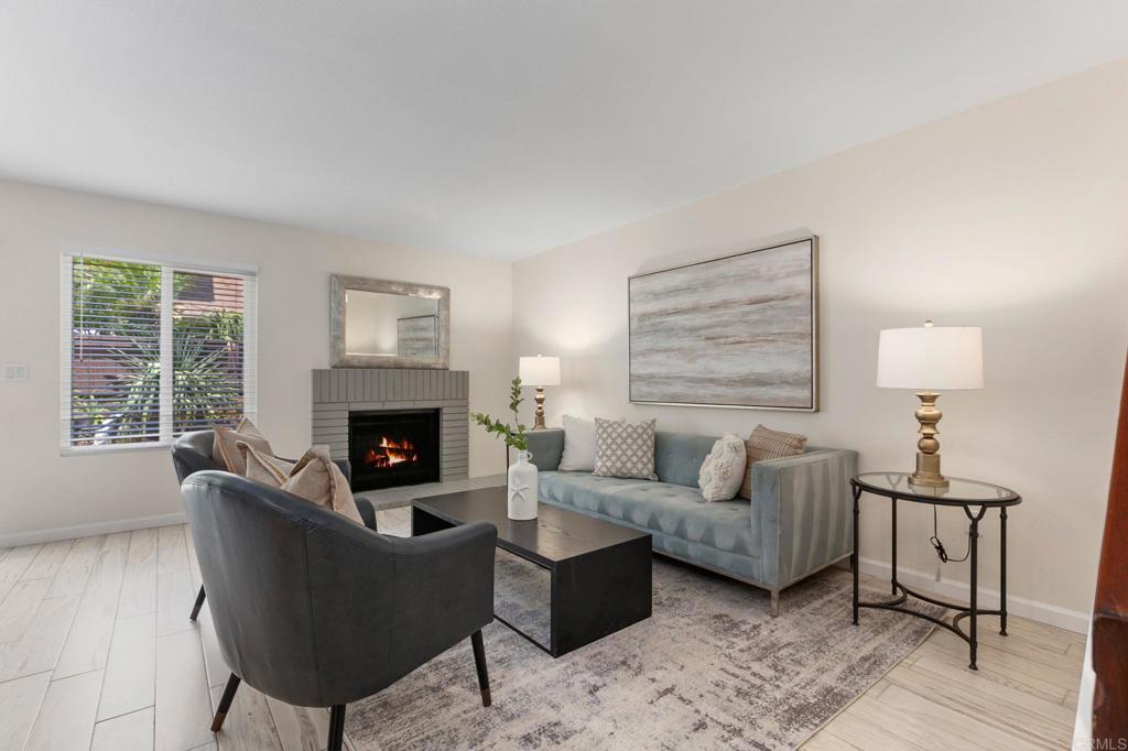 2992 Brandon Circle Carlsbad, CA 92010 - Photo 7 of 69 a living room with furniture and a fireplace