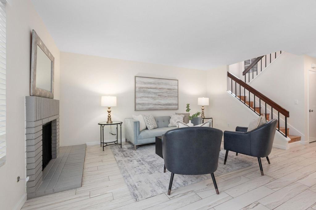 2992 Brandon Circle Carlsbad, CA 92010 - Photo 8 of 69 a living room with furniture and a fireplace