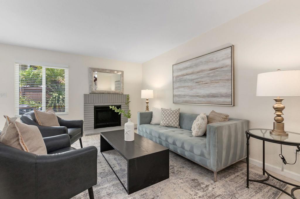 2992 Brandon Circle Carlsbad, CA 92010 - Photo 9 of 69 a living room with furniture and a fireplace