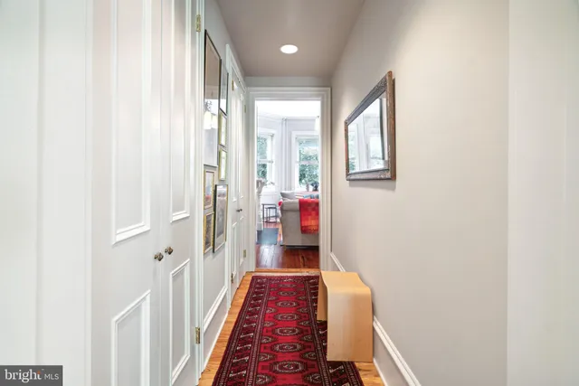 a bed room with two beds and a window