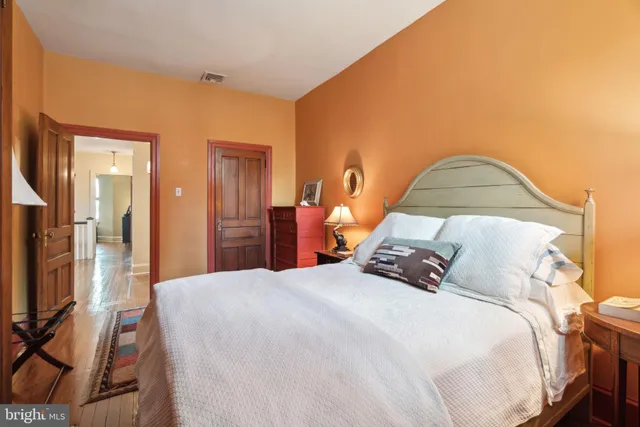 a large kitchen with kitchen island granite countertop a sink window and stainless steel appliances