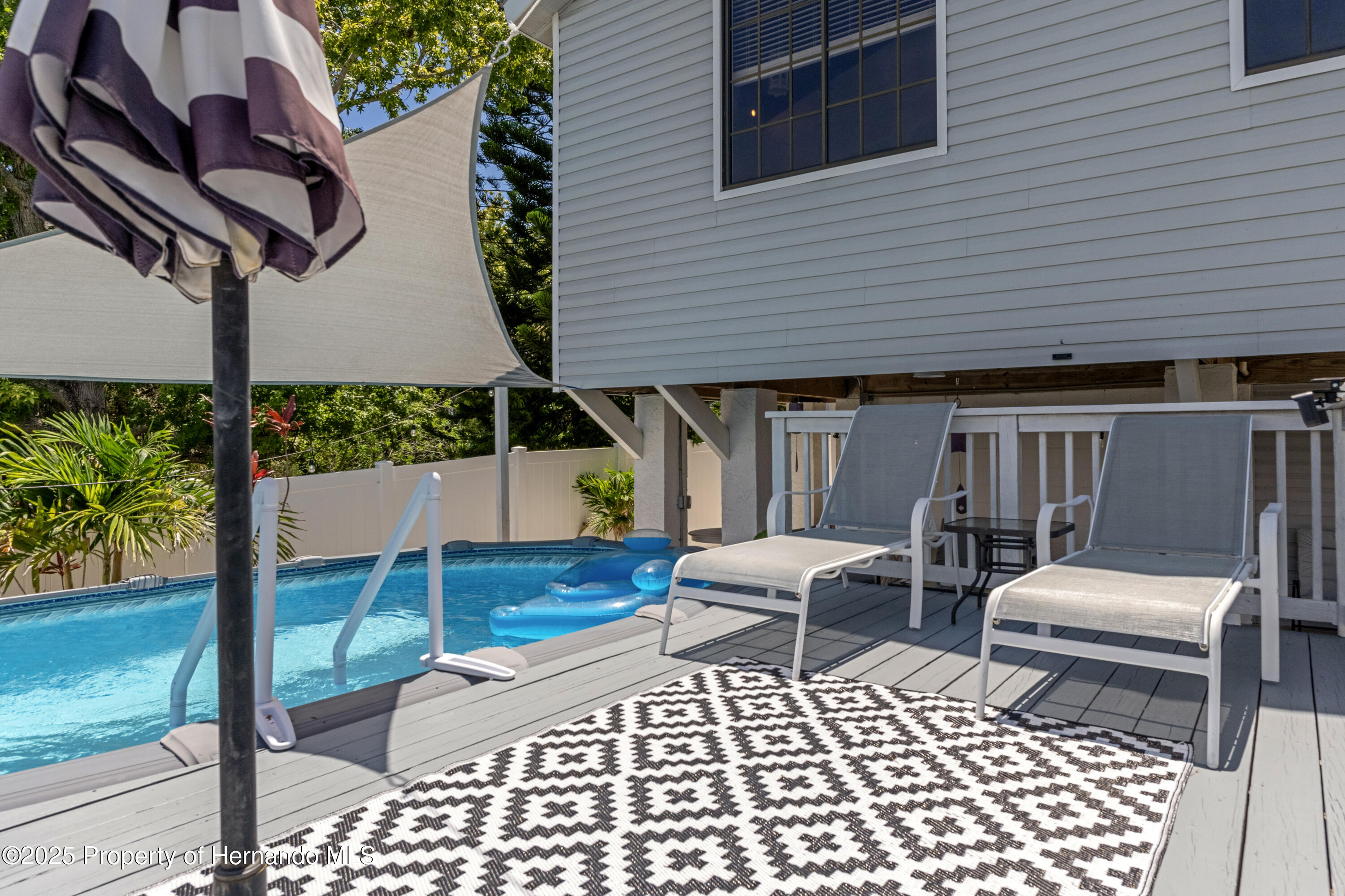 3216 Sea Grape Drive Hernando Beach, FL 34607 - Photo 29 of 39 Pool with Deck