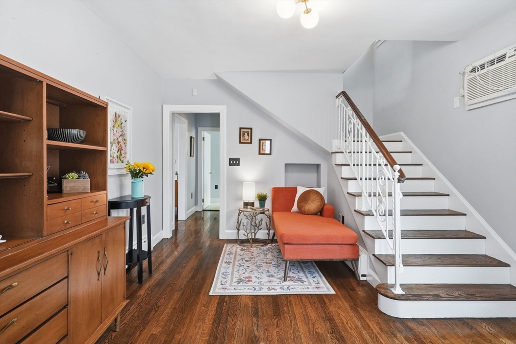 17 Vogel Street Boston, MA 02132 - Photo 16 of 43 a living room with furniture and a wooden floor