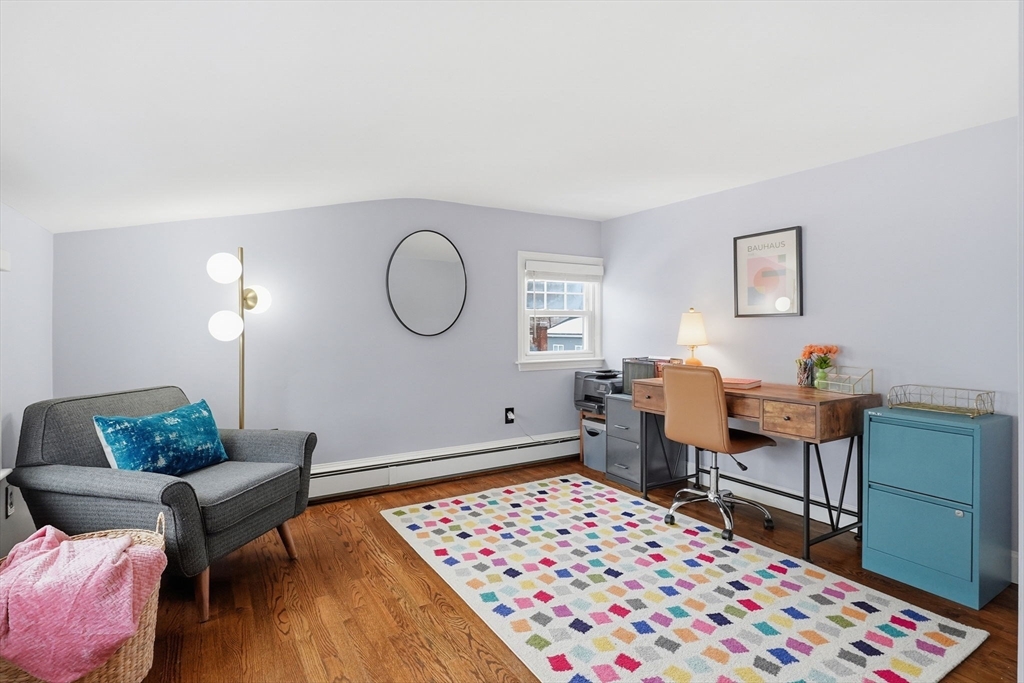 17 Vogel Street Boston, MA 02132 - Photo 30 of 43 a living room with furniture and wooden floor